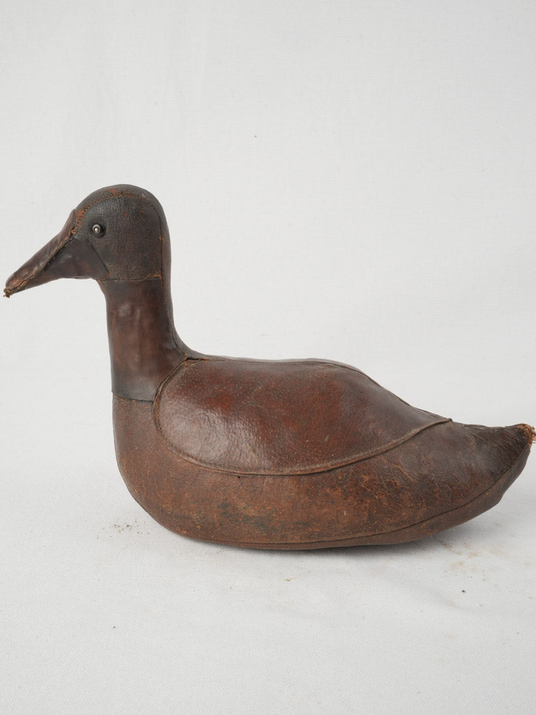 Handcrafted early-century duck figurine