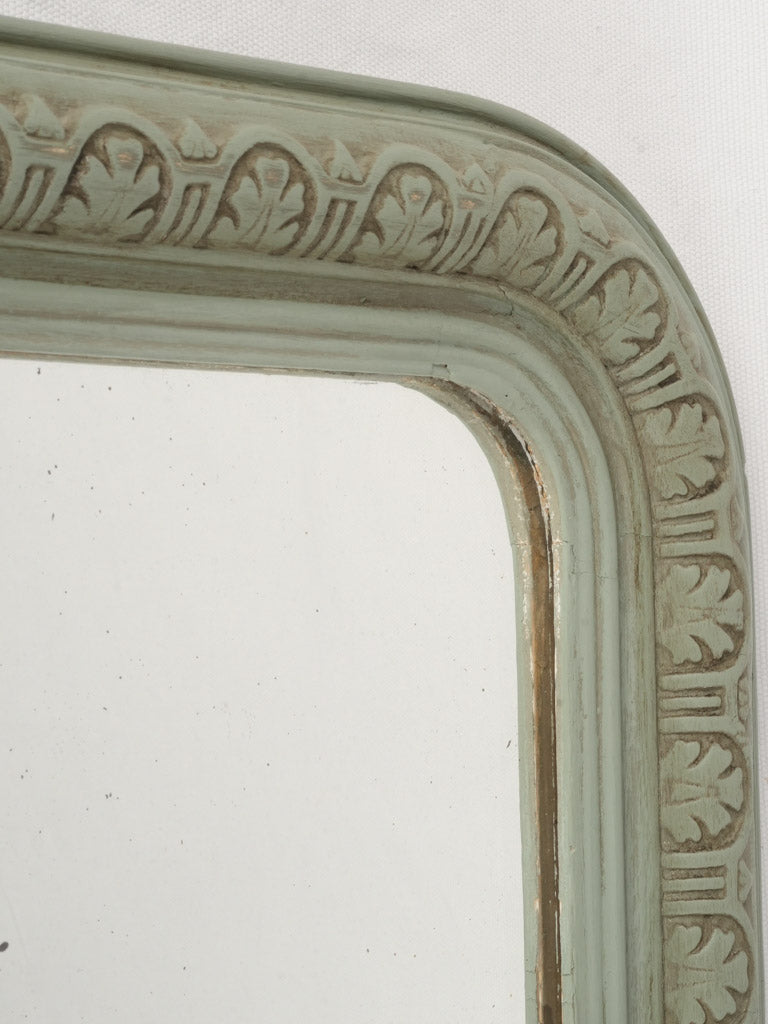 Elegant foxed glass decorative mirror