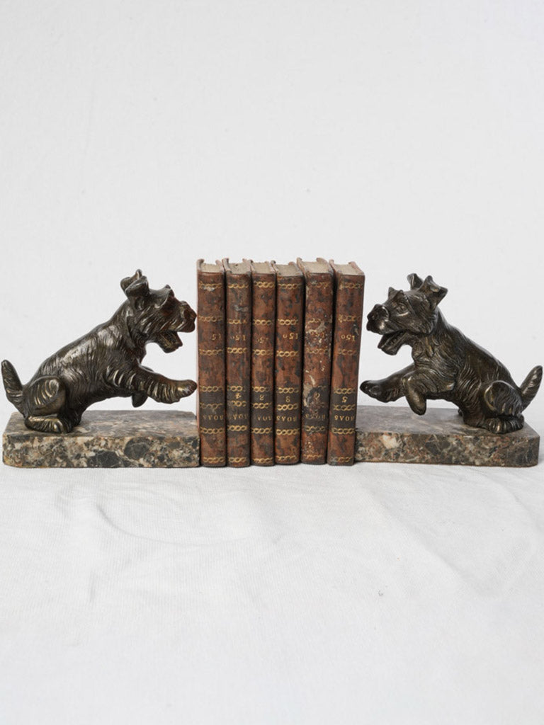 Historical metal terrier sculptures