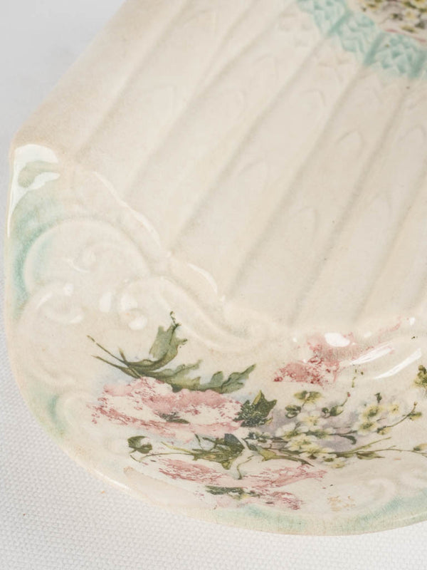 Turquoise-tipped white earthenware serving piece