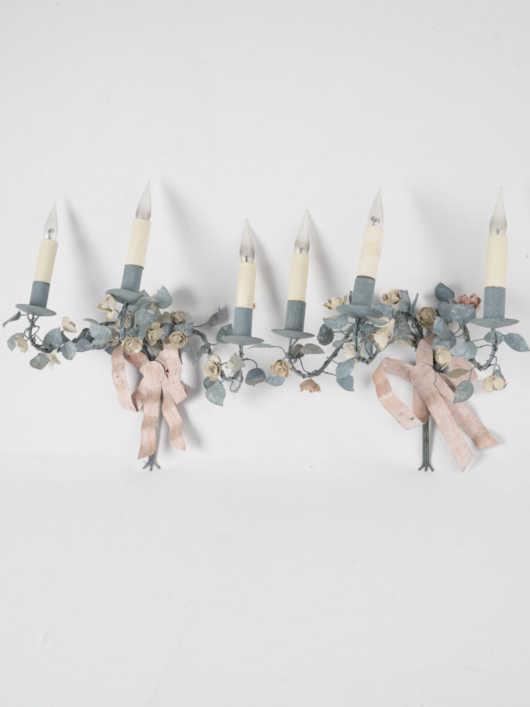 Charming pink bow adorned sconces