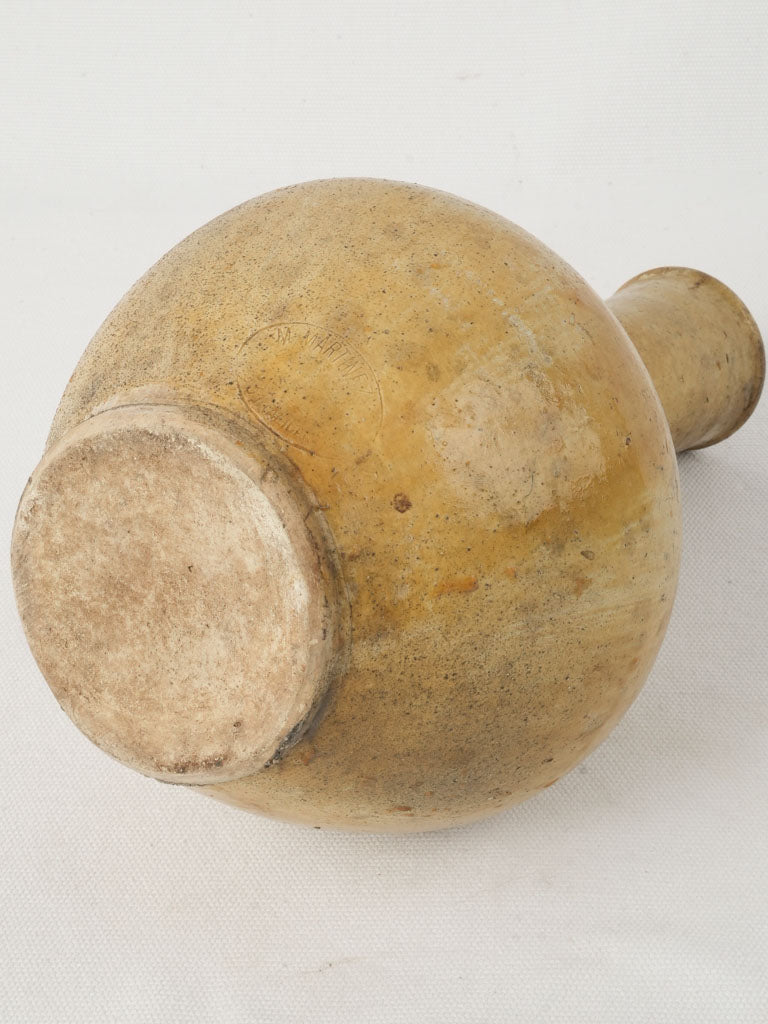 Timeworn finish pottery bottle