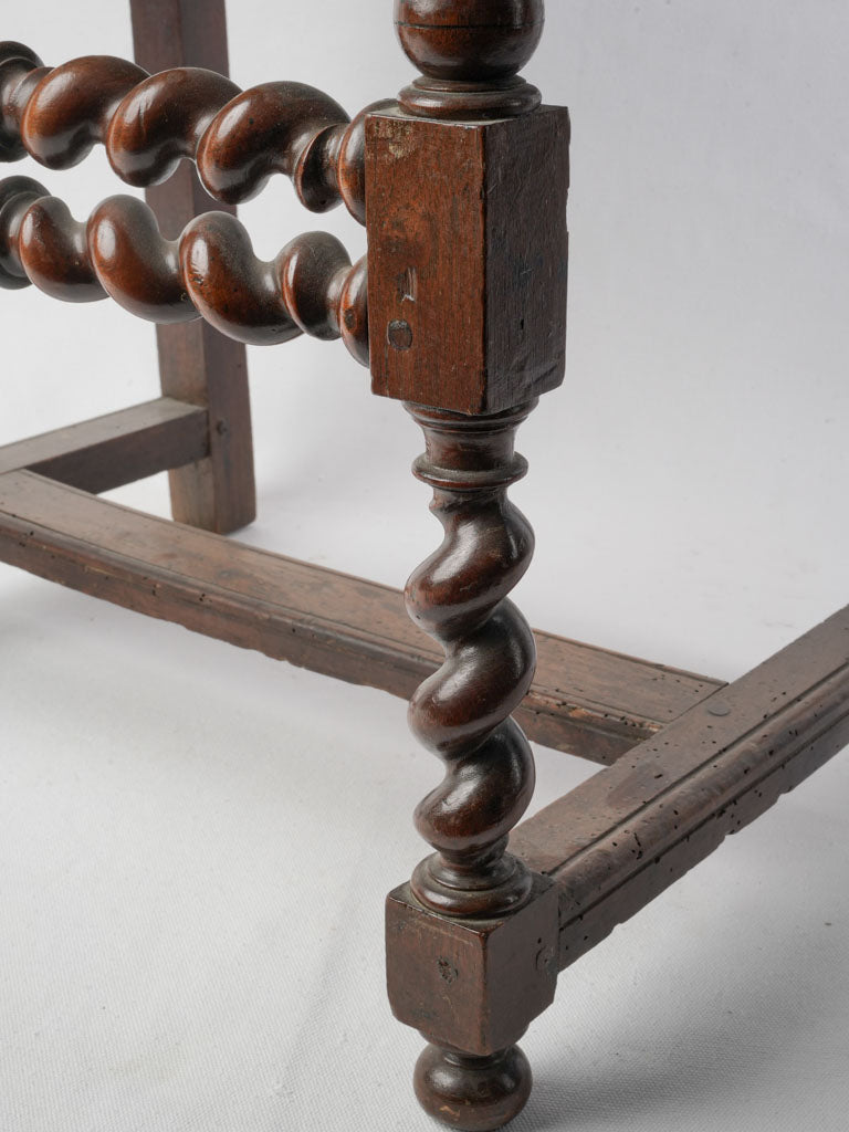 Richly turned walnut armchair
