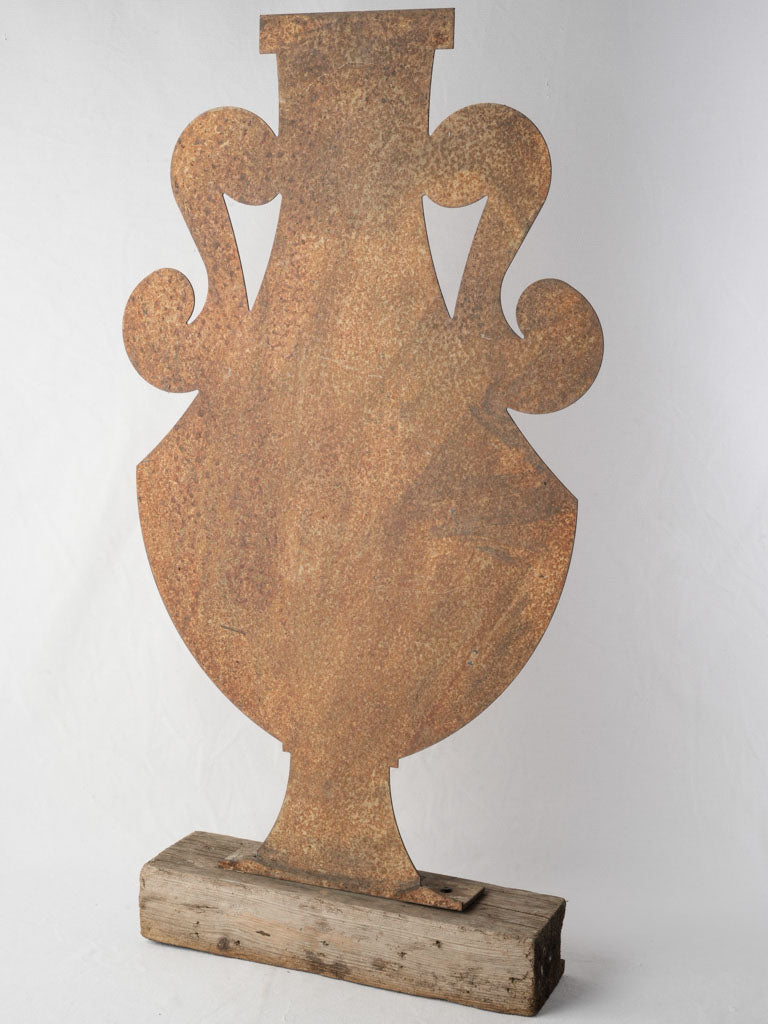 Weathered amphora silhouette sculpture