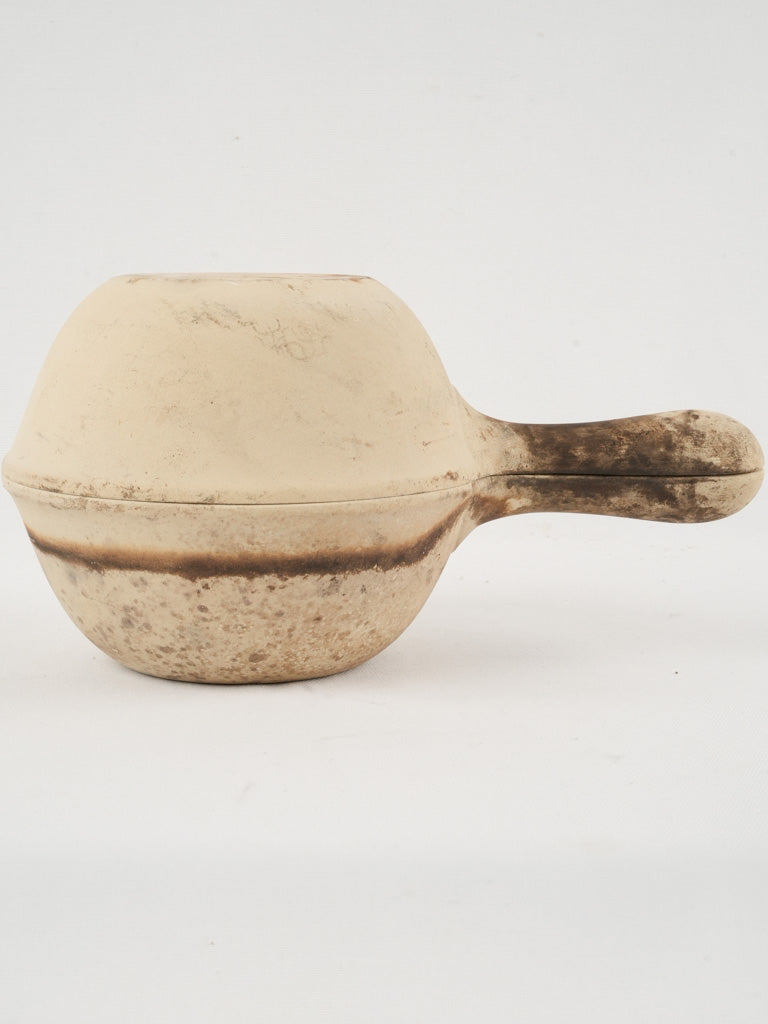 Traditional terracotta cooking 'diable rousset'