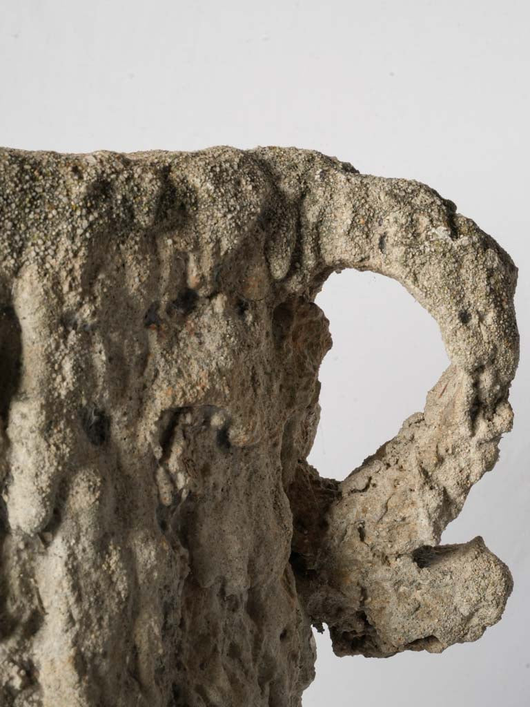 Heavily textured cement urn