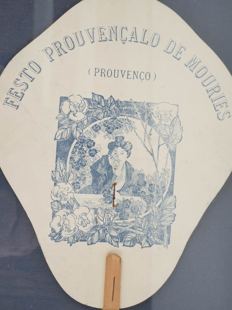Intricate Arlesian woman paper fan