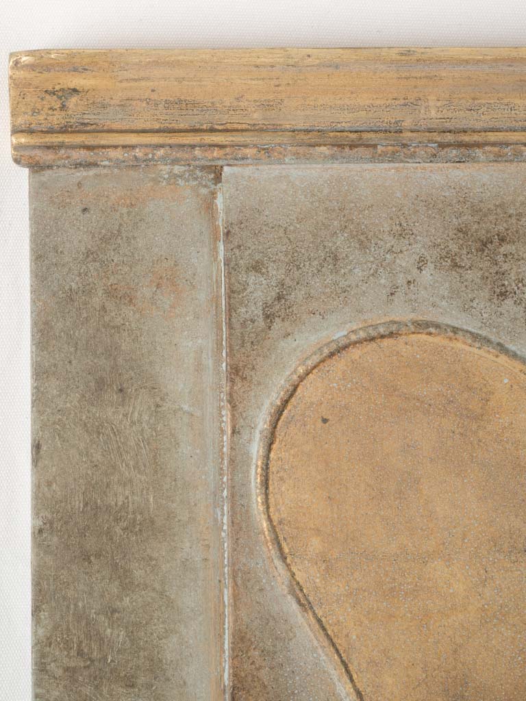 Intricate scrollwork trumeau mirror