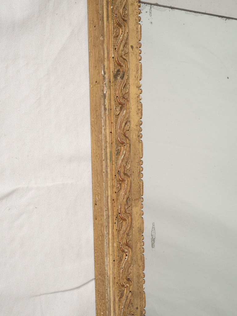 Stylish antiqued gold-tone wall mirror