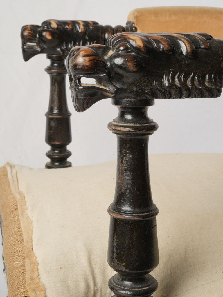 Aged ebonized wooden lion chair