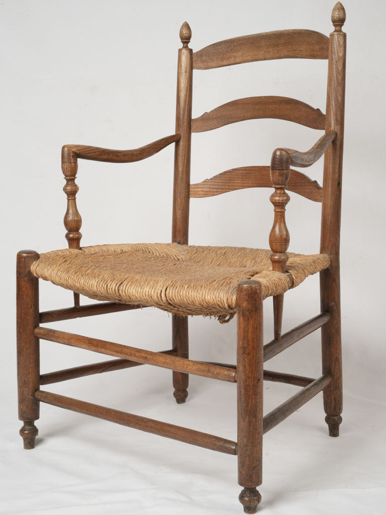 Antique rush seat armchair
