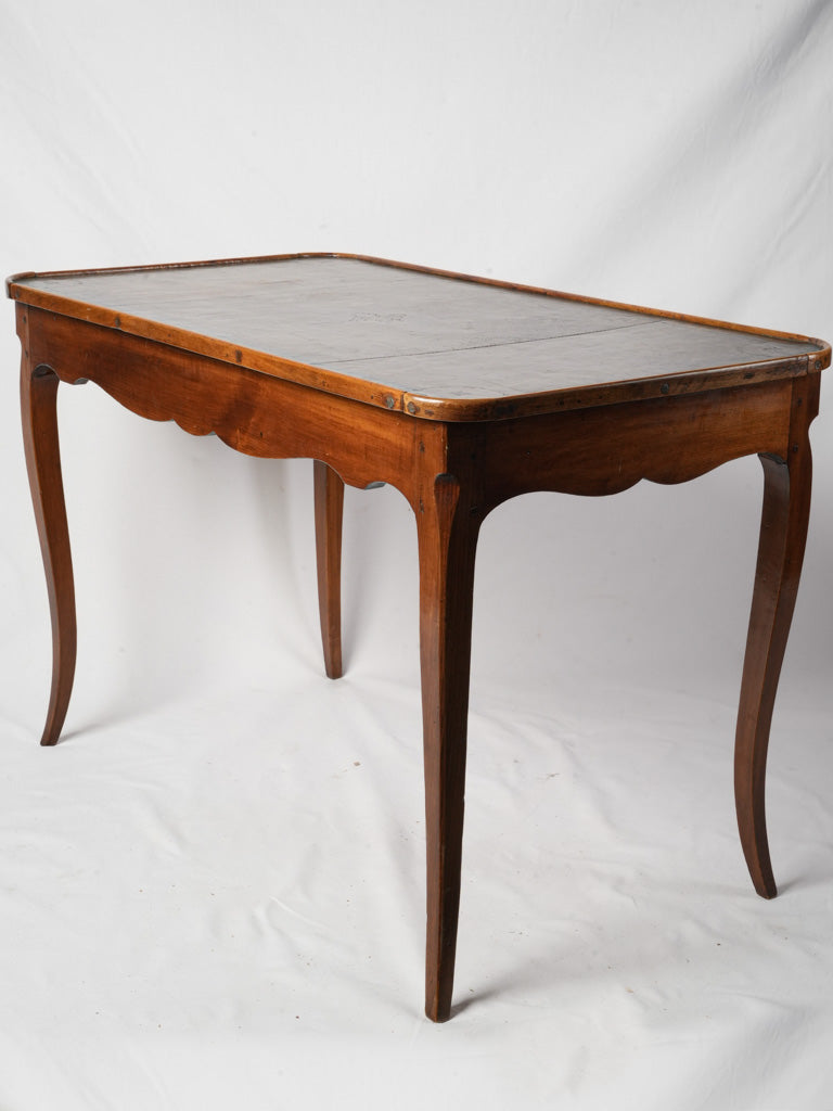 Patina-rich gray leather table