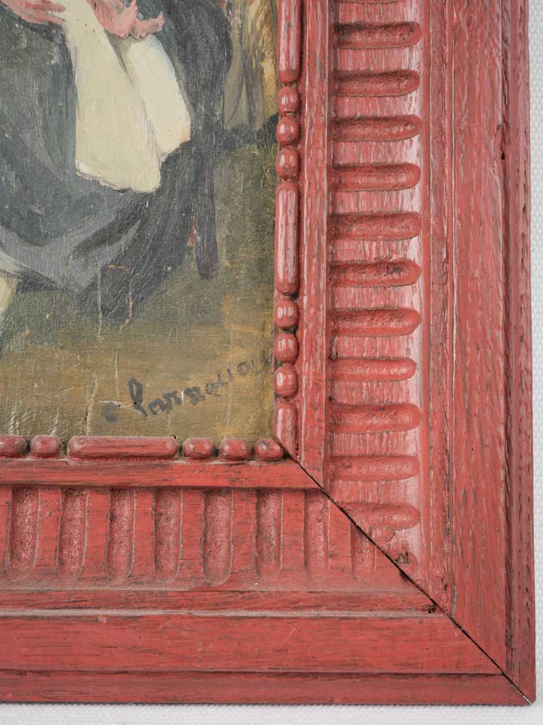 Red framed early-century nursery artwork