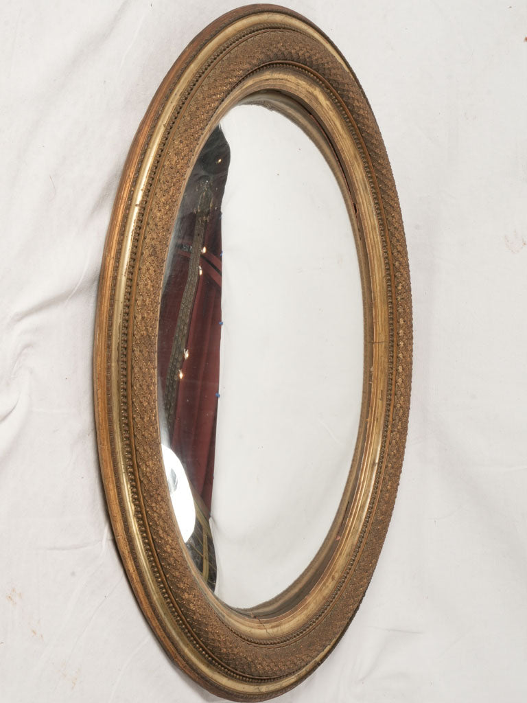 Ornate golden witch's mirror