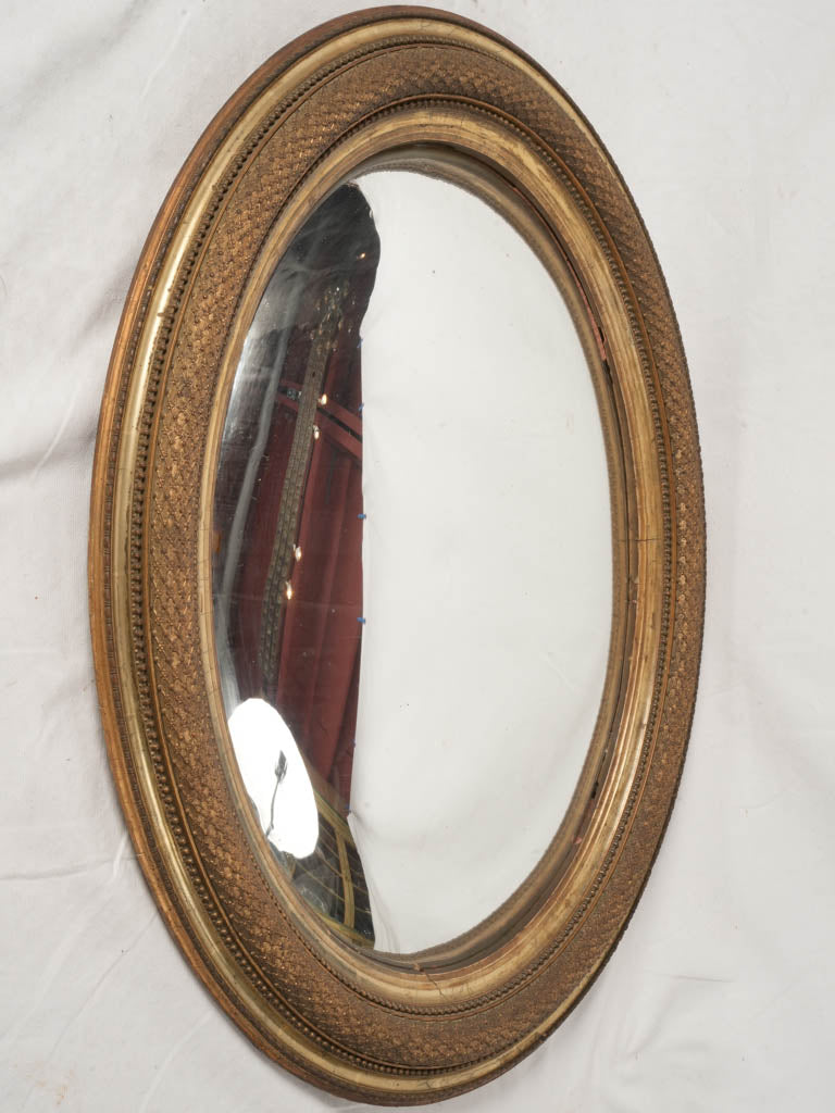 Intricate gilt frame vintage mirror