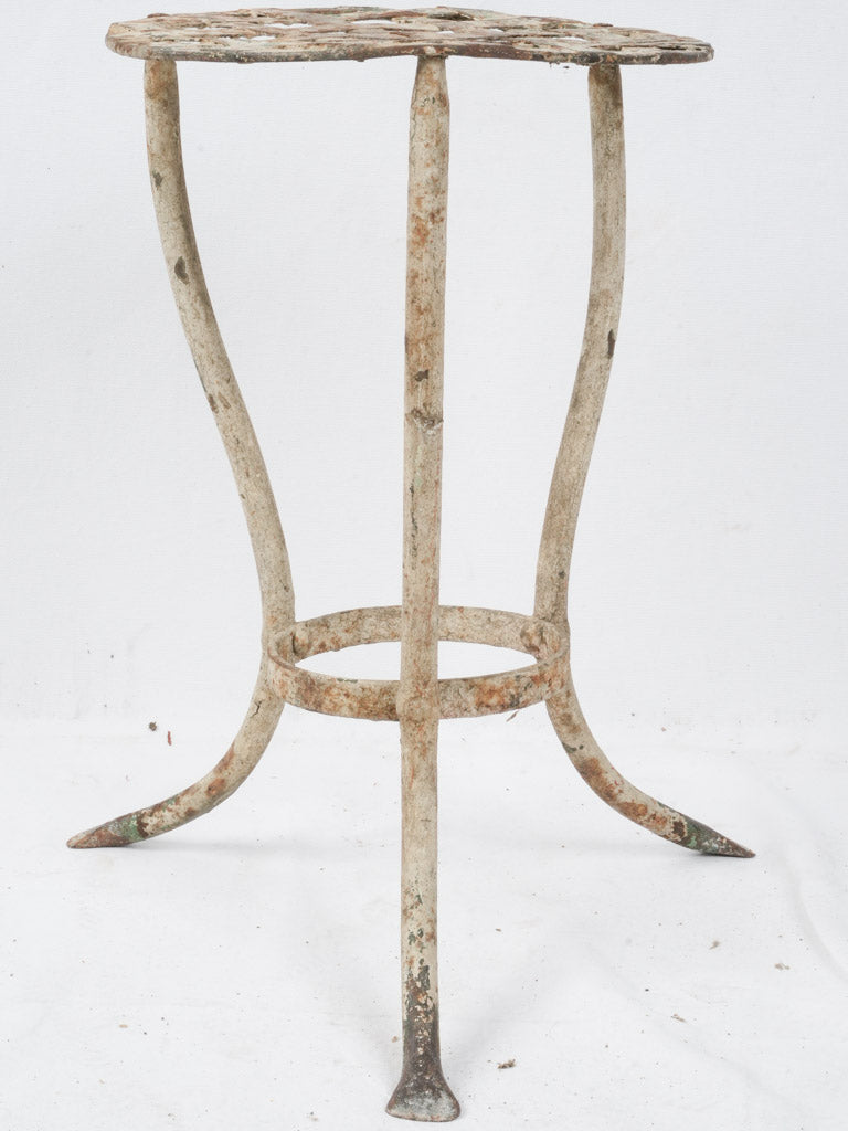 Graceful weathered patina iron seat