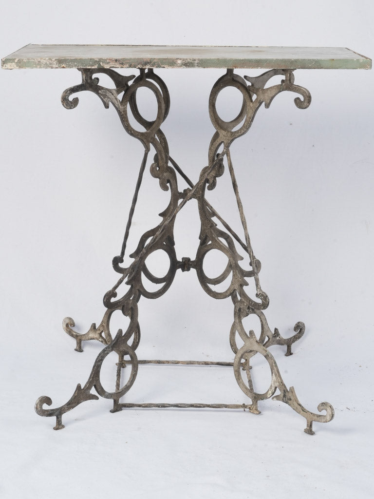 Delicate weathered patina side table