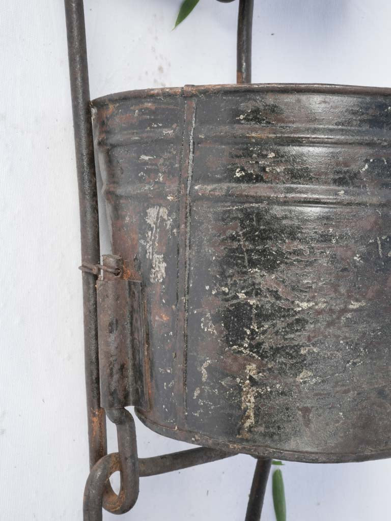 Historical iron wall-mounted rack