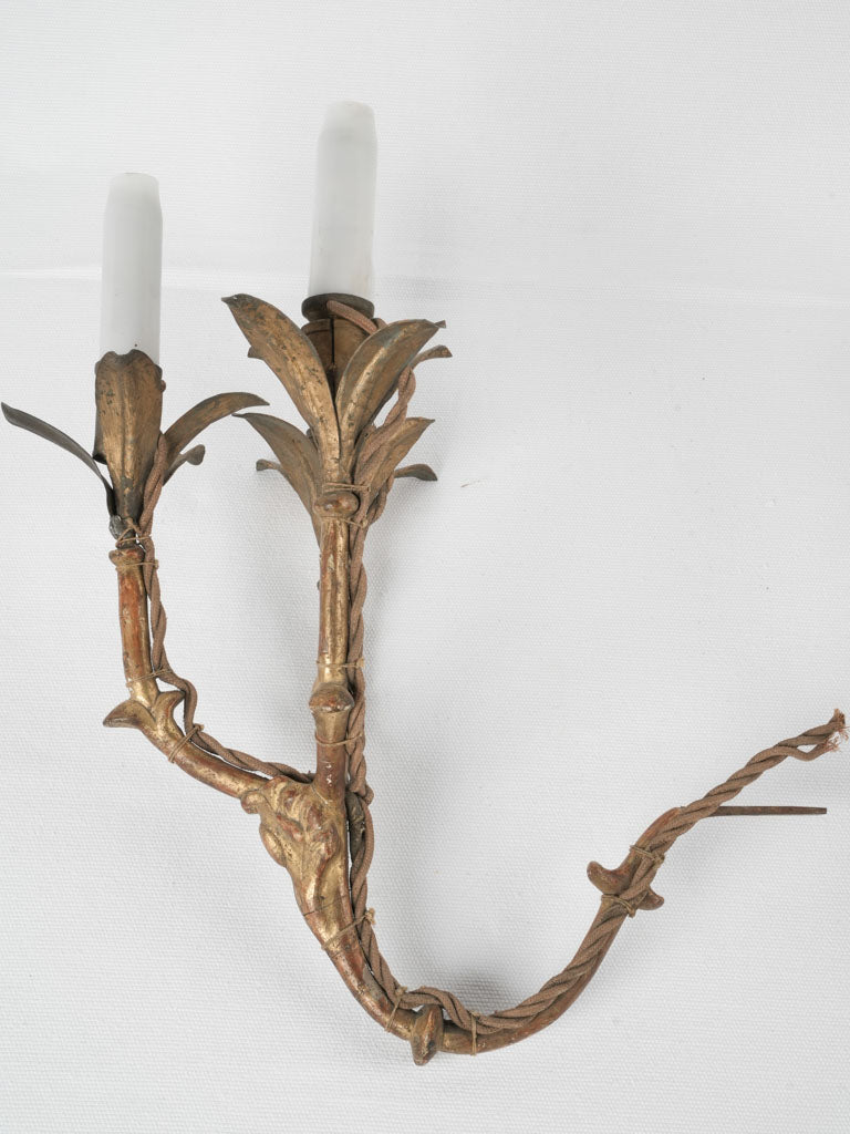 Ornate gilded leaf wall sconces