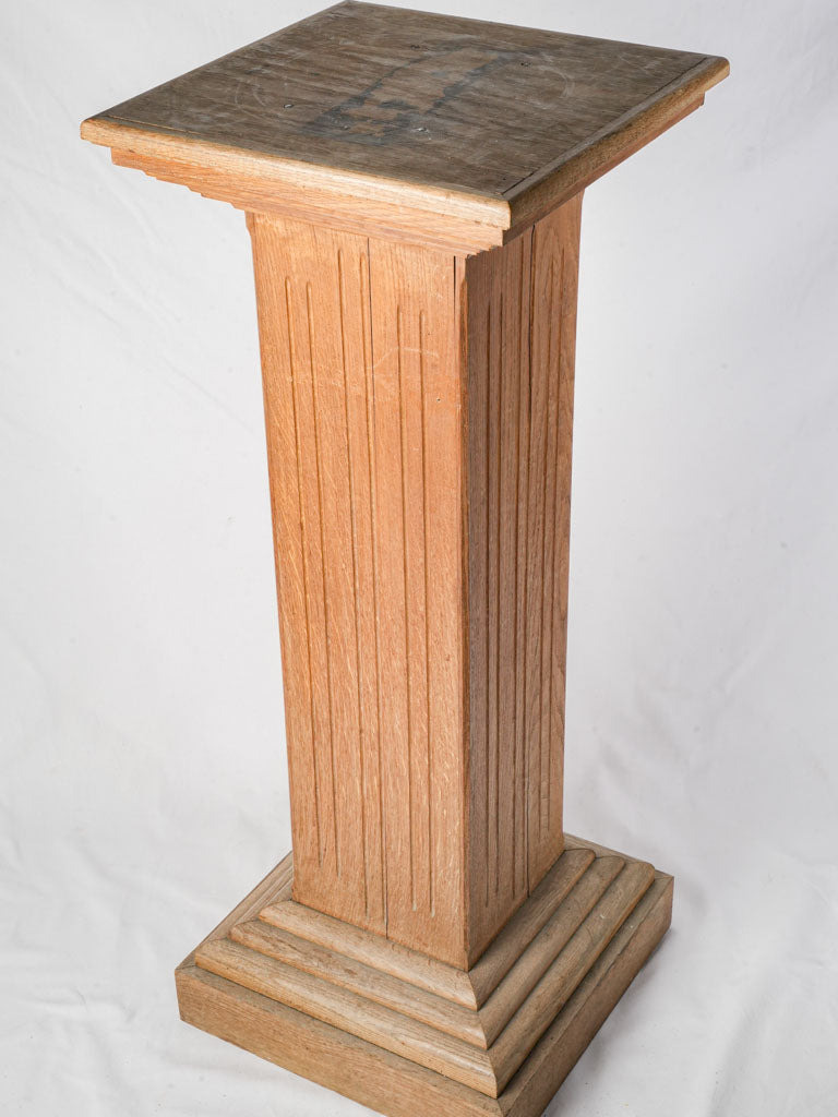 Stepped-base oak art pedestal