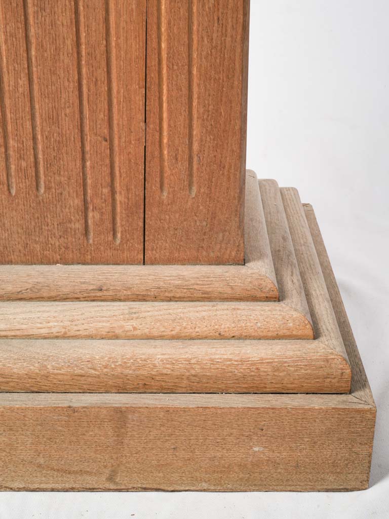 Neutral oak pedestal for art