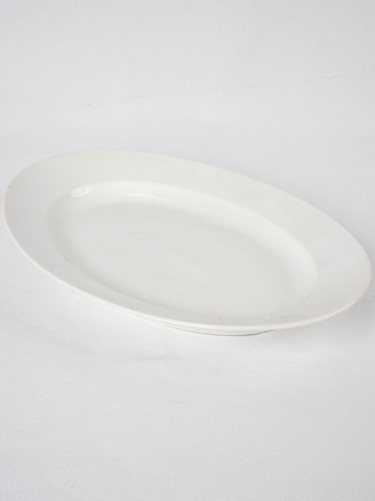 Antique, opulent white porcelain platter