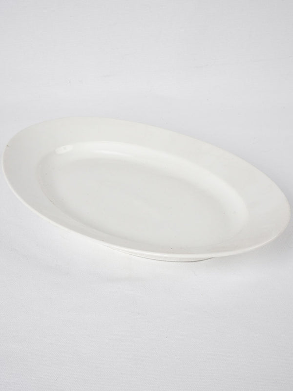 Antique, opulent white porcelain platter