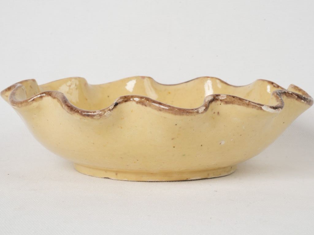 Distinctive rippled edge terracotta bowl