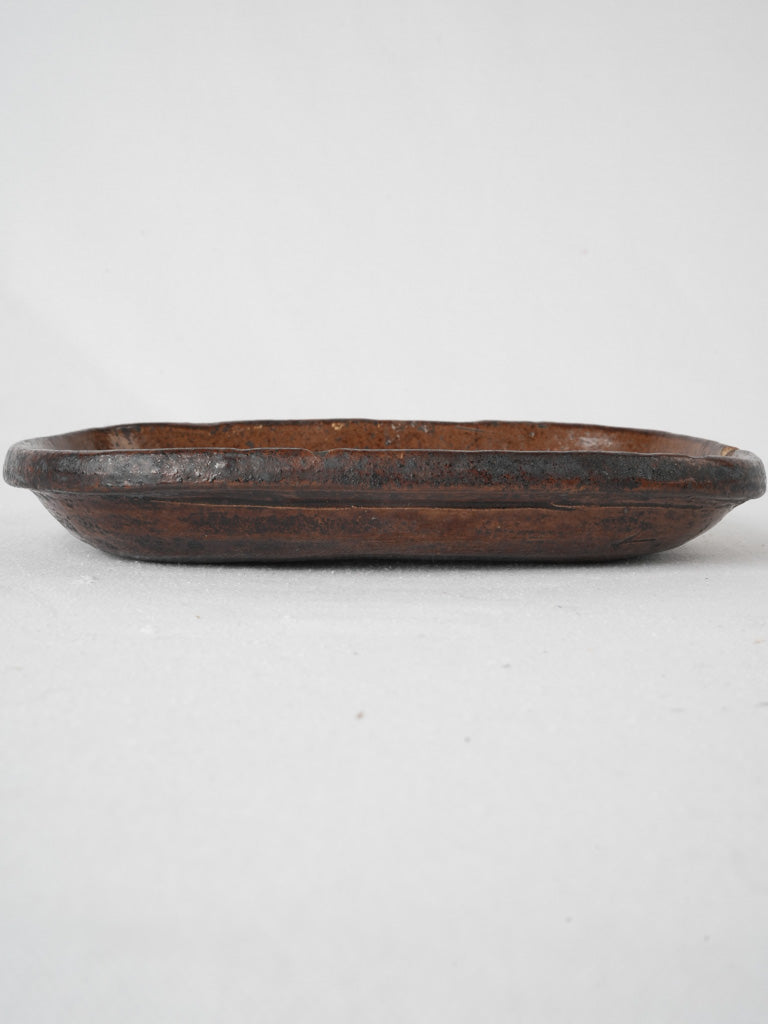 Decorated brown glazed serving dish