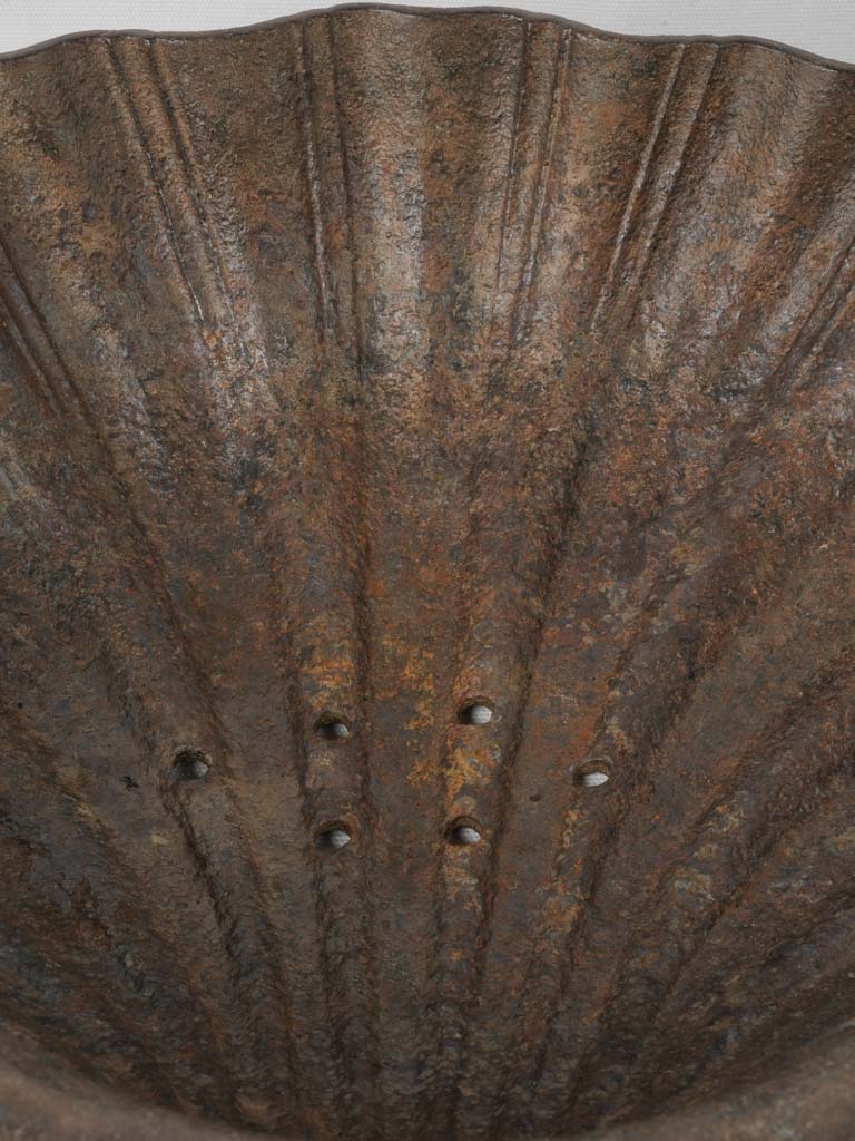 Ornate symbolic scallop shell