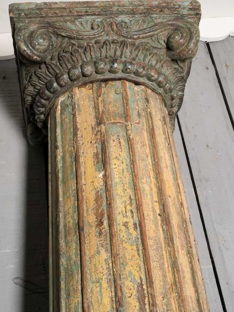 Timeworn acanthus carved wood columns