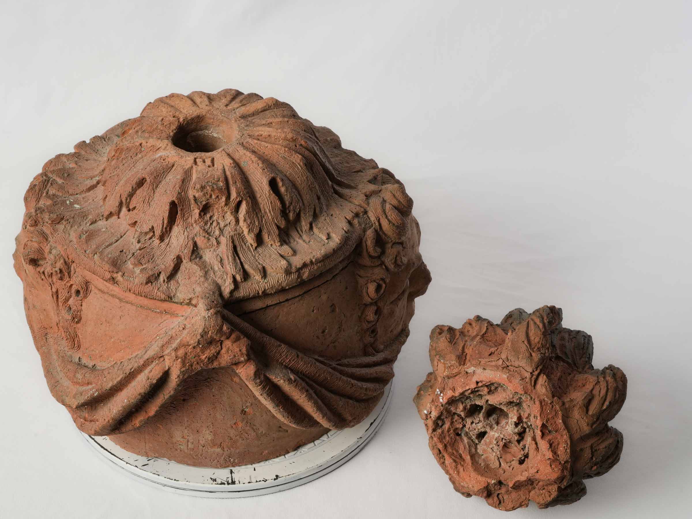French Architectural Terracotta Flame Finial w/ Intriguing Mascarons, 18th Century - 18½"