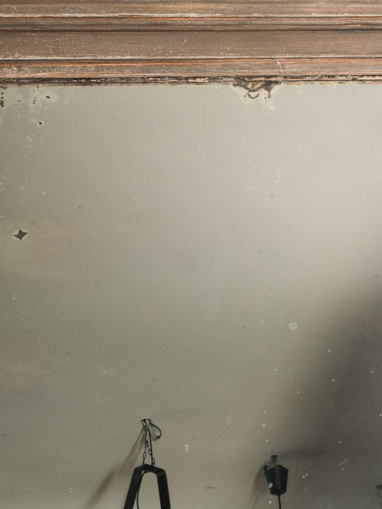 Muted warm walnut-brown loft mirror