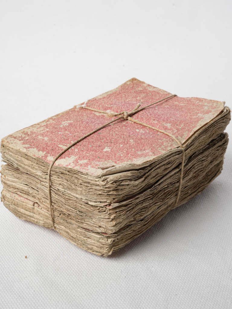 Decorative worn pink paper books  