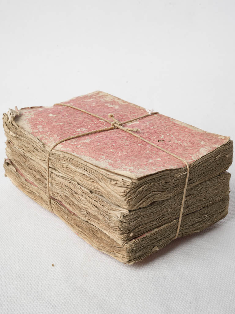 Patinated curled French paperback books