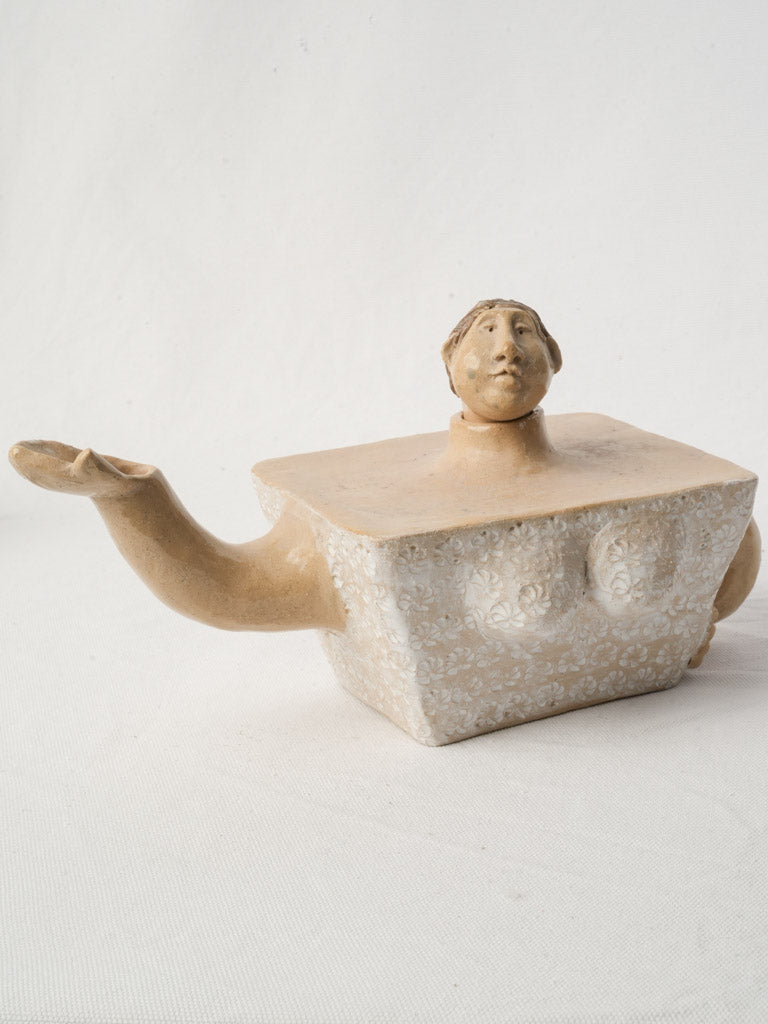 Expressive vintage teapot