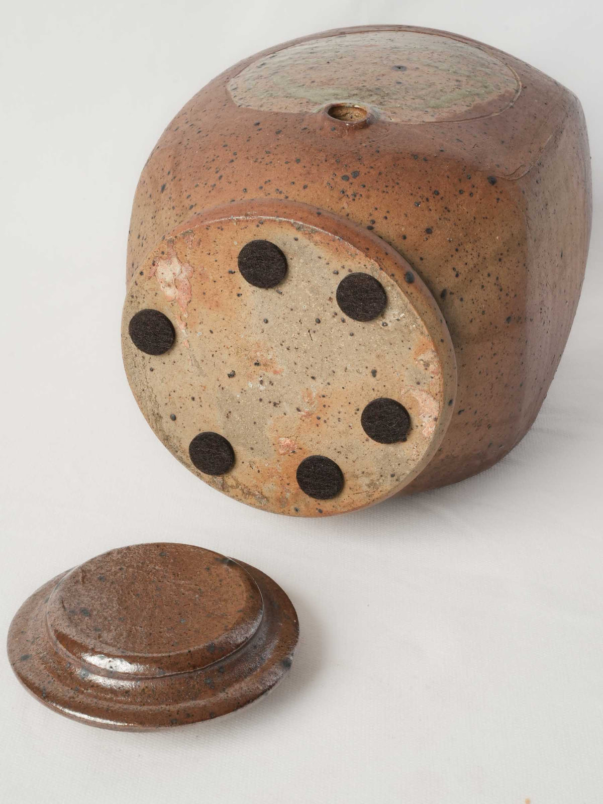 Warm-toned collectible vinegar jar