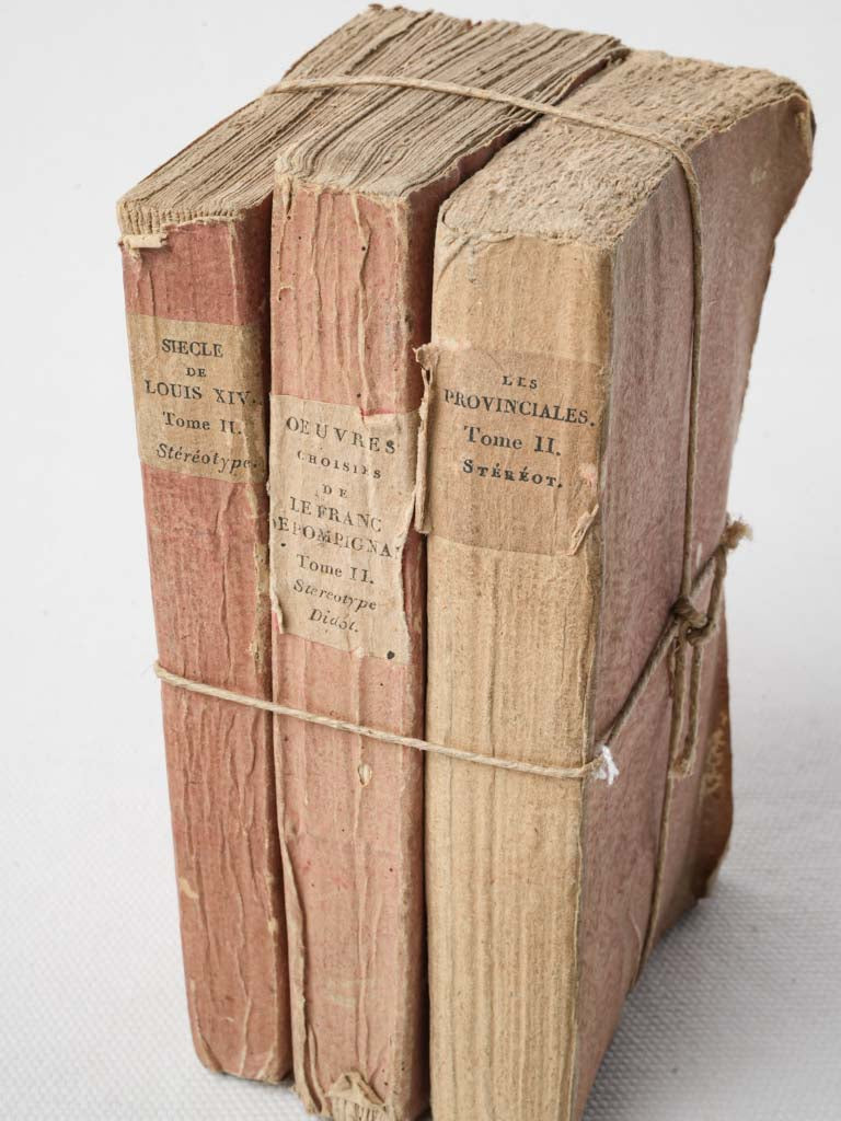 Faded pink antique French books