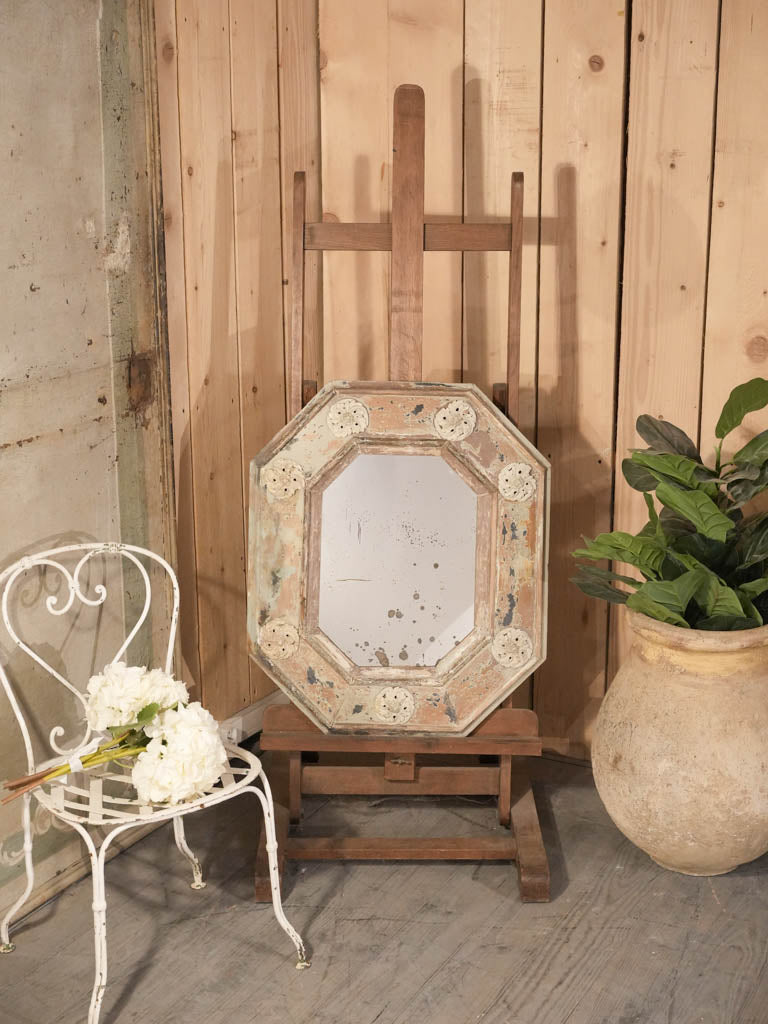 Romantic foxed glass fireplace mirror