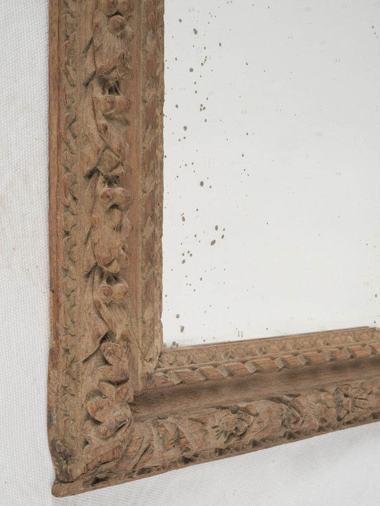 Distressed neoclassical design mirror
