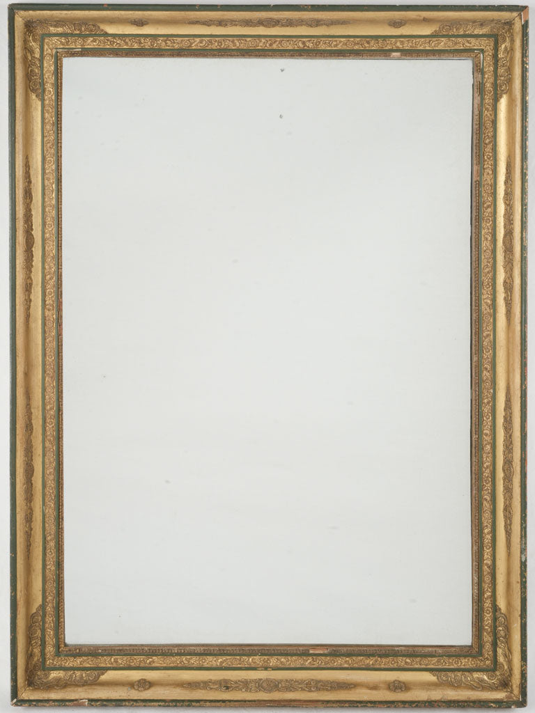 Ornamental antique gilt mirror