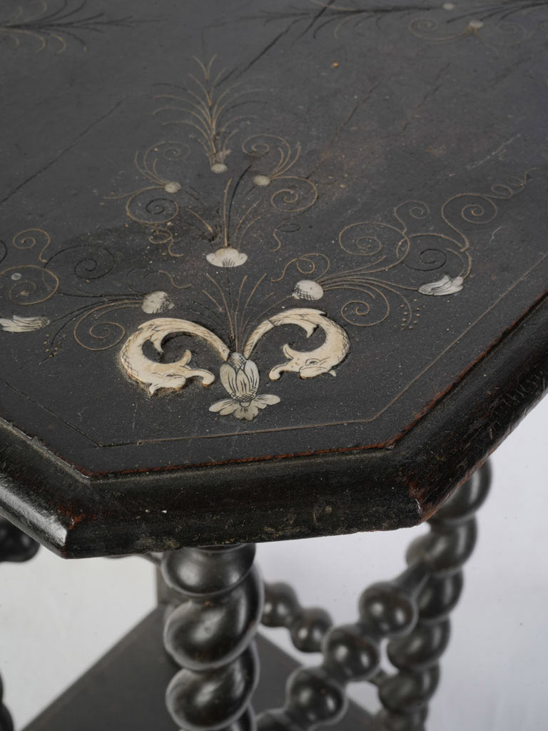 Ornate arabesque motif stand