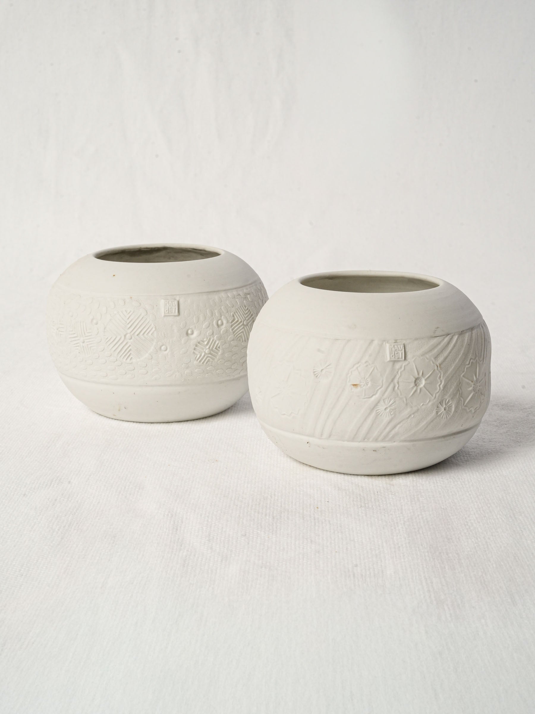 Pair of delicate porcelain candle holders by Atelier-A - 4¾"