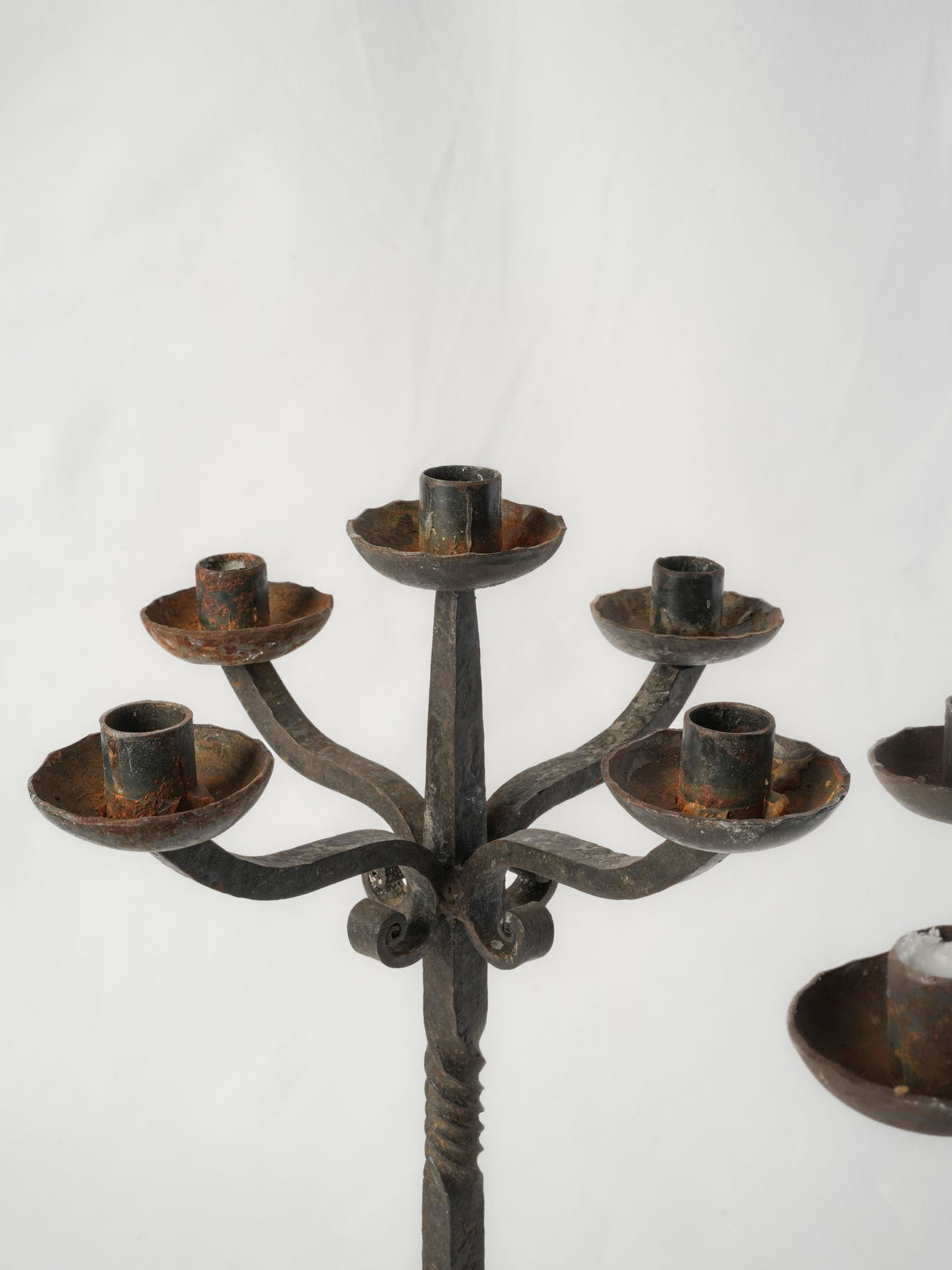 Aged Mediterranean style iron candelabra