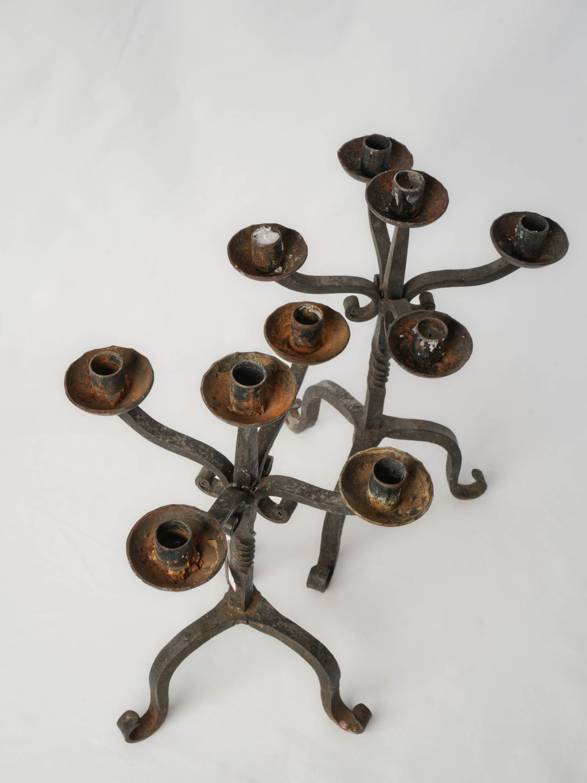 Elegant scrolling arm iron candelabra