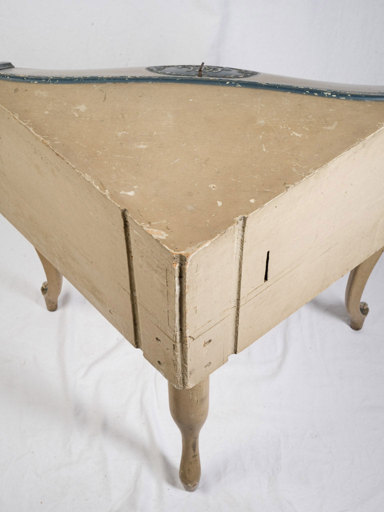 Worn green writing surface desk