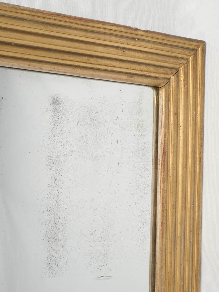 Refined austerity style mirror