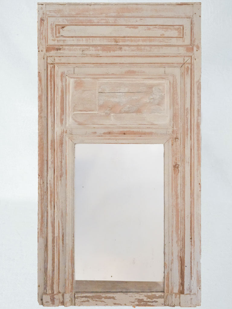 Aged antique wooden trumeau mirror