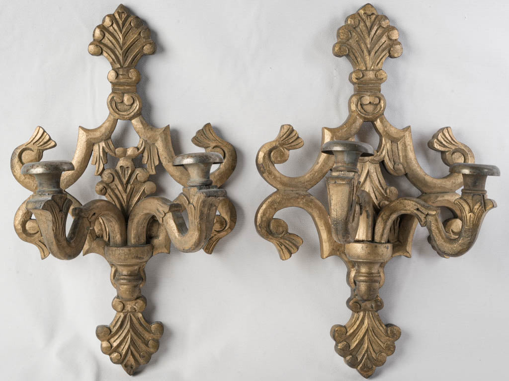 Delicate carved decorative wall sconces