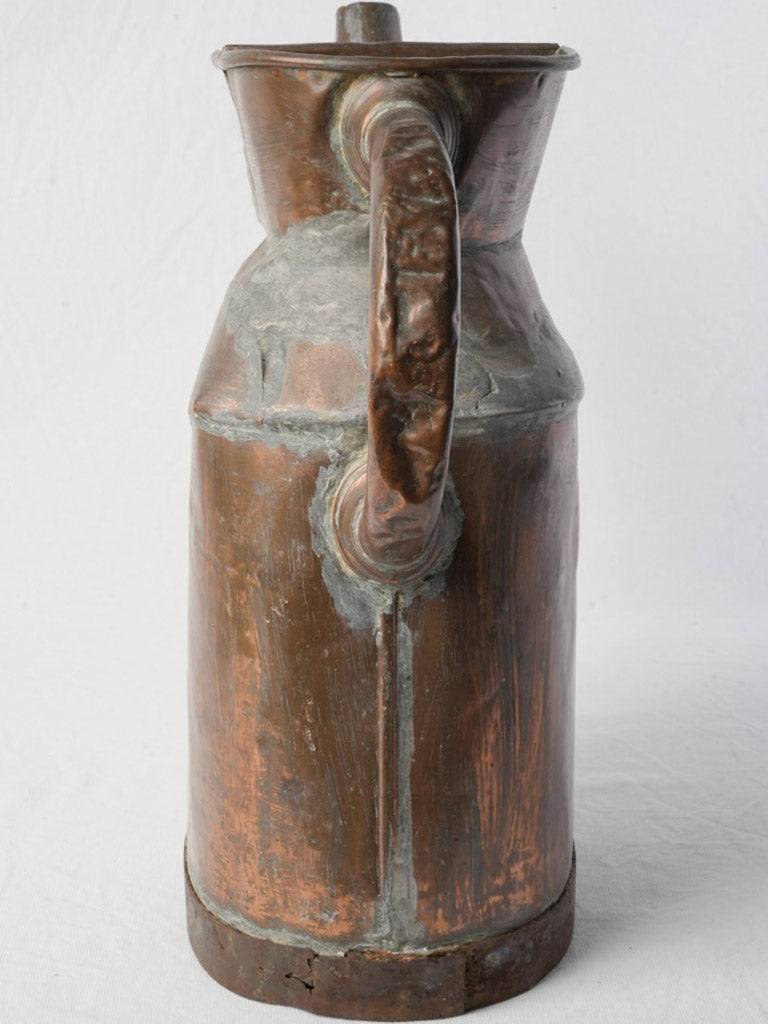 Timeworn detailed spout garden vessel